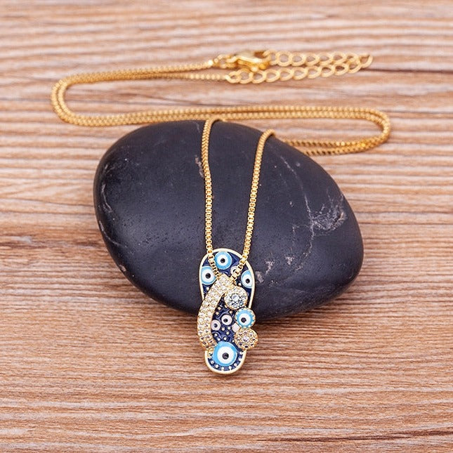 Gold Chain with Flip Flop Pendant and Evil Eye - Selma-Nora Luxe