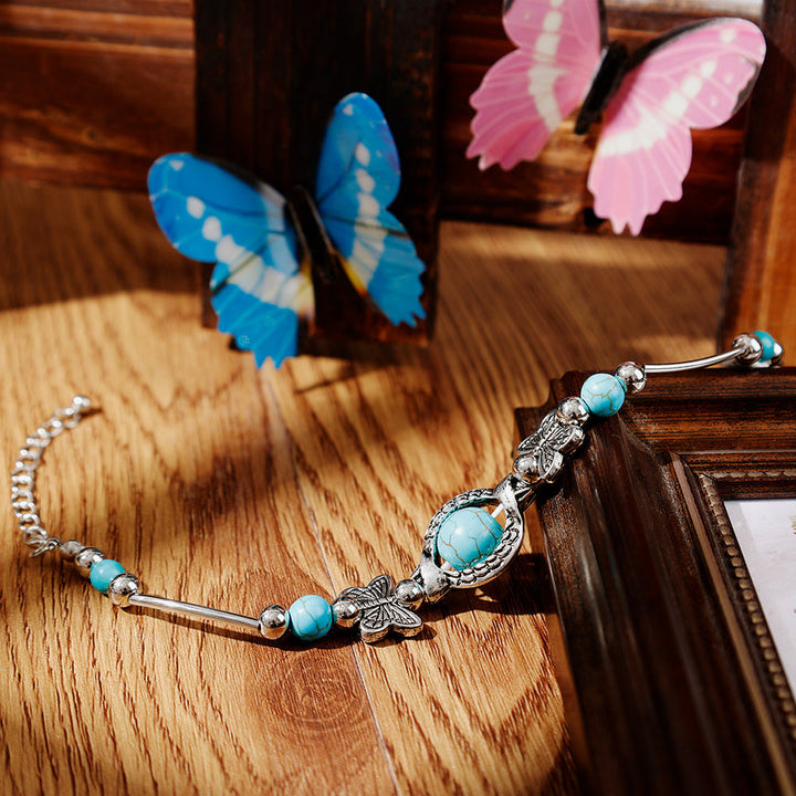 BUTTERFLY AND TURQUOISE BEAD BRACELET-Nora Luxe
