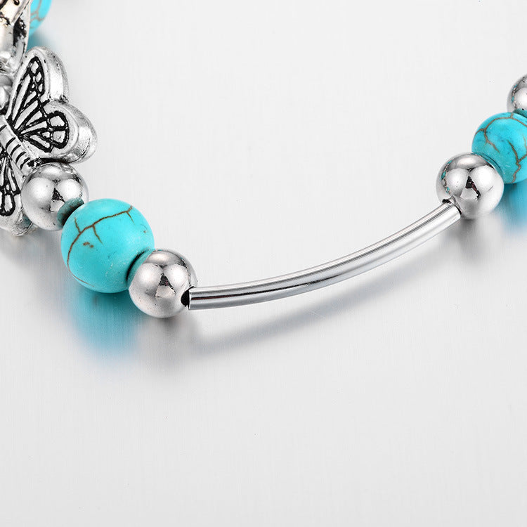 BUTTERFLY AND TURQUOISE BEAD BRACELET-Nora Luxe