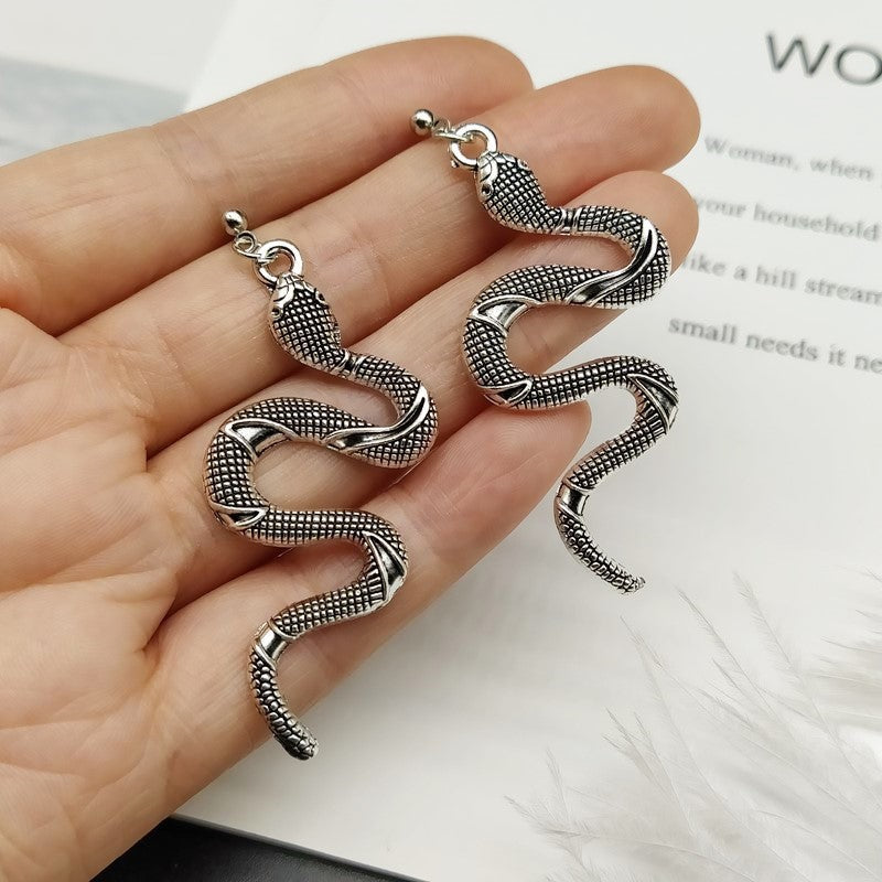 Chic Crystal Serpent Earrings | Snake-Inspired Glamour-Gold earrings snake-Nora Luxe