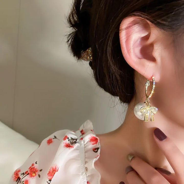 CHRISTMAS PEARL AND BOW EARRINGS-BEIGE-Nora Luxe