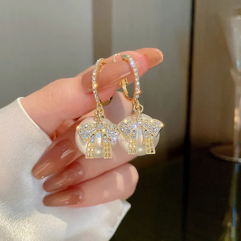 CHRISTMAS PEARL AND BOW EARRINGS-BEIGE-Nora Luxe
