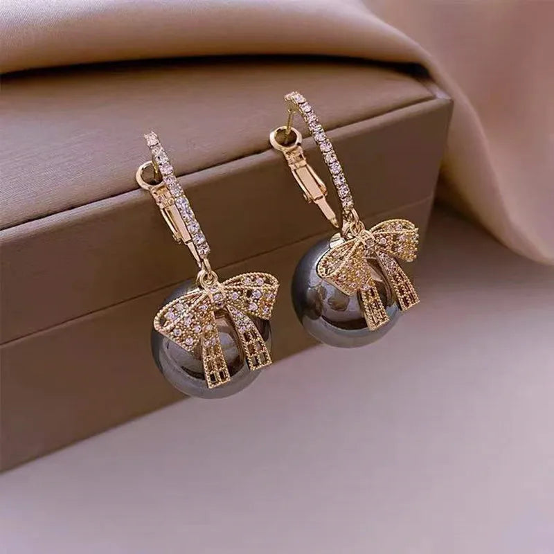CHRISTMAS PEARL AND BOW EARRINGS-GRAY-Nora Luxe