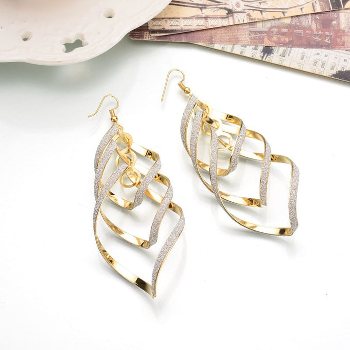 Golden Spiral Earrings | Unique Statement Jewellery-Nora Luxe