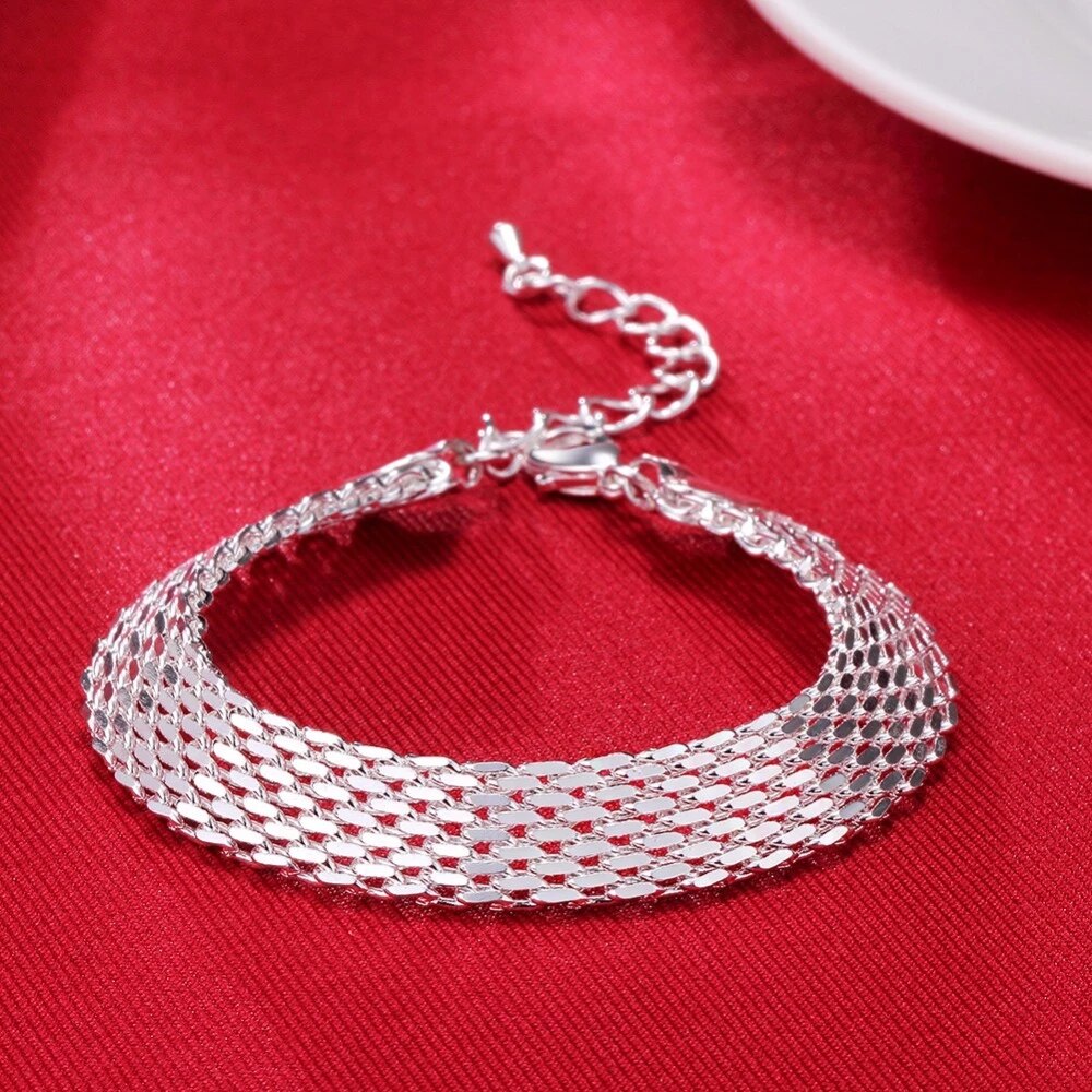 Lucky Silver Braided Bracelet | Fortune Positivity Charm-Nora Luxe