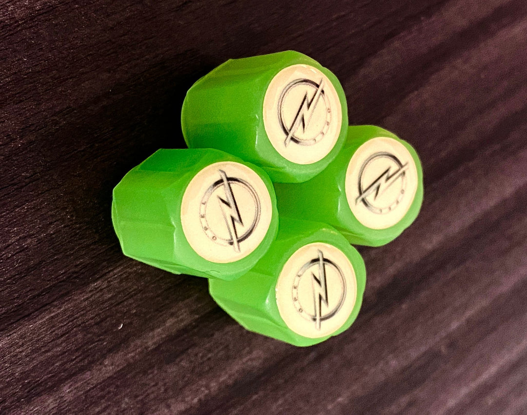 Set of 4 Glow-in-the-Dark Valve Caps with Logo – LuxaGlow-Opel-Nora Luxe