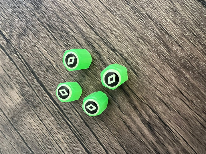 Set of 4 Glow-in-the-Dark Valve Caps with Logo – LuxaGlow-Renault-Nora Luxe