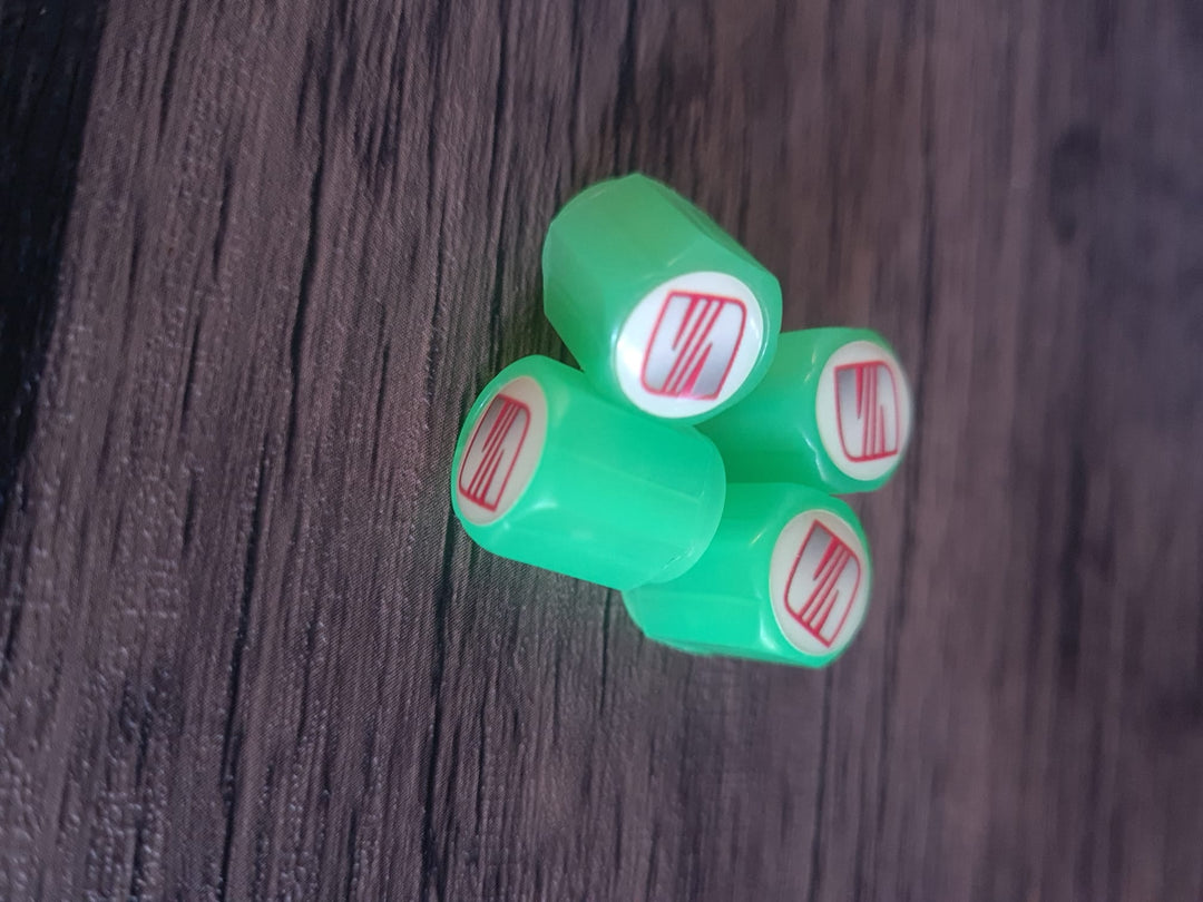 Set of 4 Glow-in-the-Dark Valve Caps with Logo – LuxaGlow-Seat-Nora Luxe