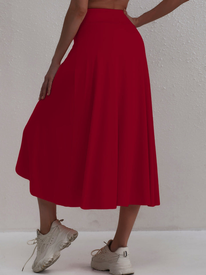 Sporty women's skirt with a high waistband & asymmetric cut – Alexia-Coral-S-Nora Luxe