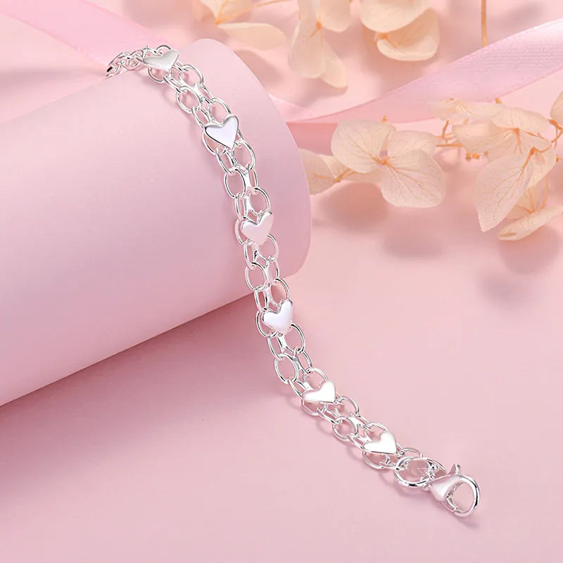 Sterling Silver Heart Bracelet | Classic Elegance-Nora Luxe