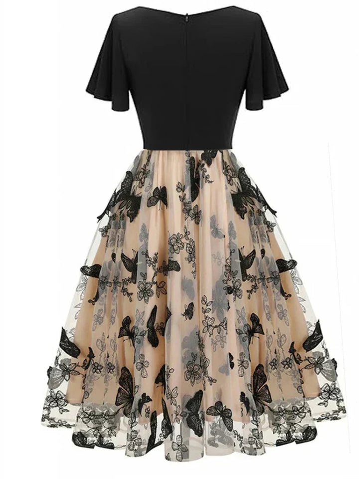 Stylish midi dress made of mesh with embroidery & flounce sleeves – Maila-S-Nora Luxe