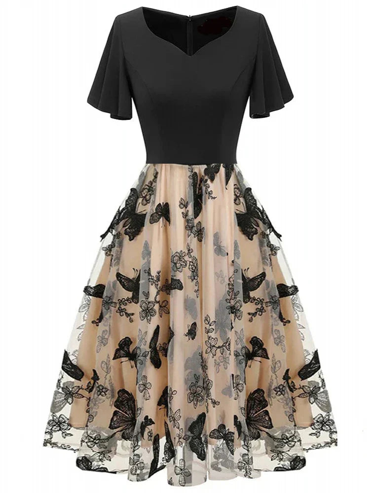 Stylish midi dress made of mesh with embroidery & flounce sleeves – Maila-S-Nora Luxe