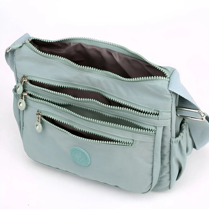 Waterproof and Spacious Women's Shoulder Bag - Maya-Black-Nora Luxe